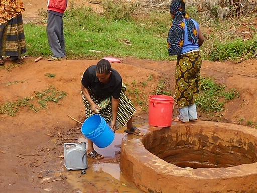 Eva collecting water from the 